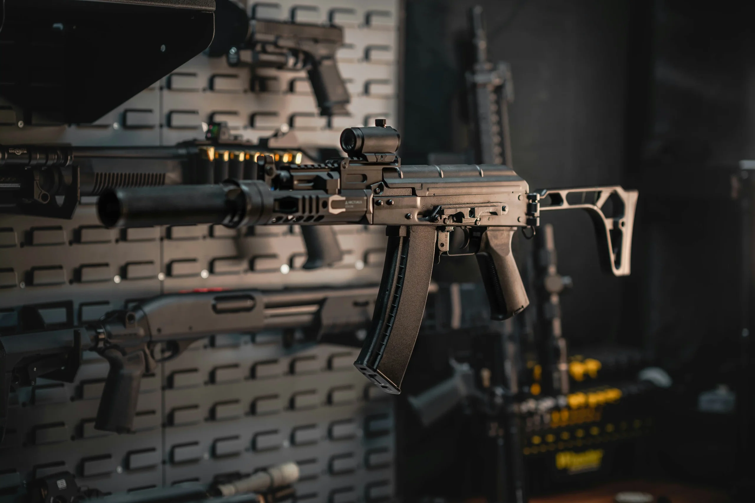 An engaging image featuring a selection of high-quality firearms and accessories, showcasing the variety and professionalism of our home-based gun store.